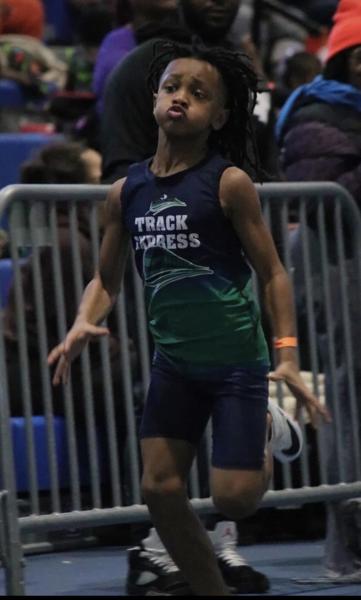 Track Express athlete celebrating at the finish area