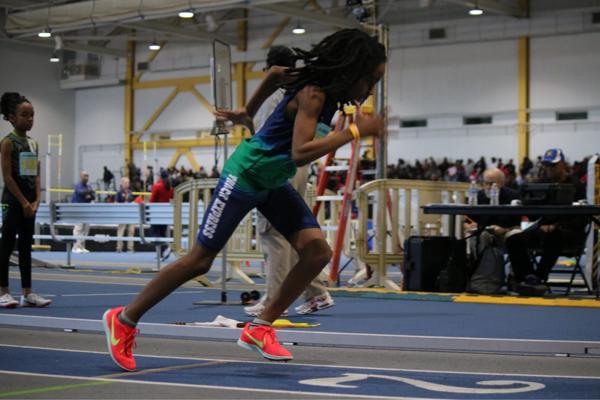 Track Express sprinter racing on the indoor track