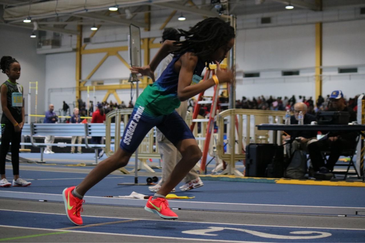 Track Express sprinter racing on the indoor track